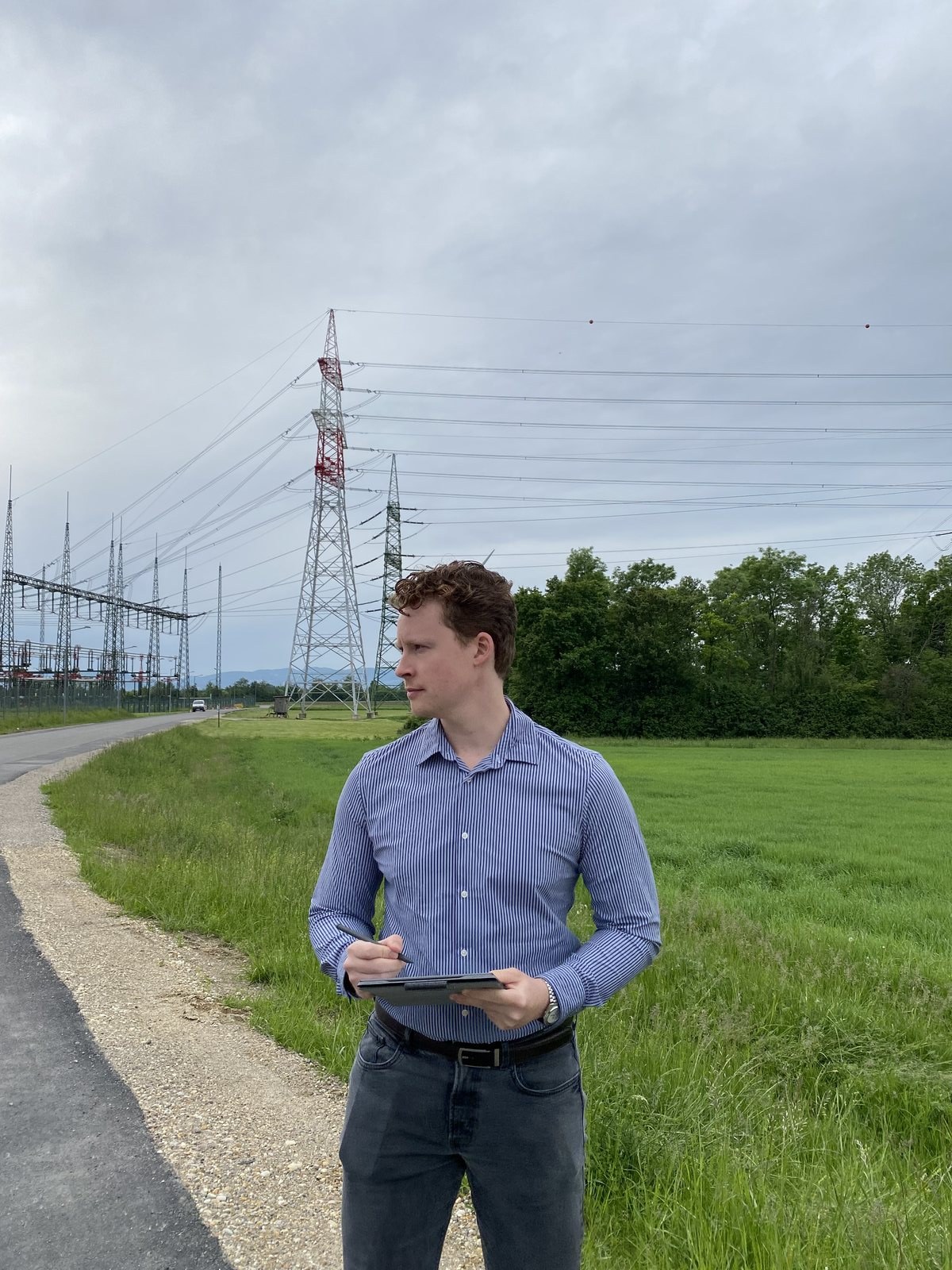 Harald Bartsch, CEO of Terraformer, standing in front of energy infrastructure in a rural setting.